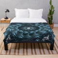 Stylish and cozy plush blanket with a designer touch