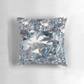 Closeup of a diamond-patterned decorative throw pillow on a couch