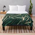 Emerald green and gold marble pattern plush blanket