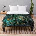 Plush, jewel-toned faux malachite marble blanket