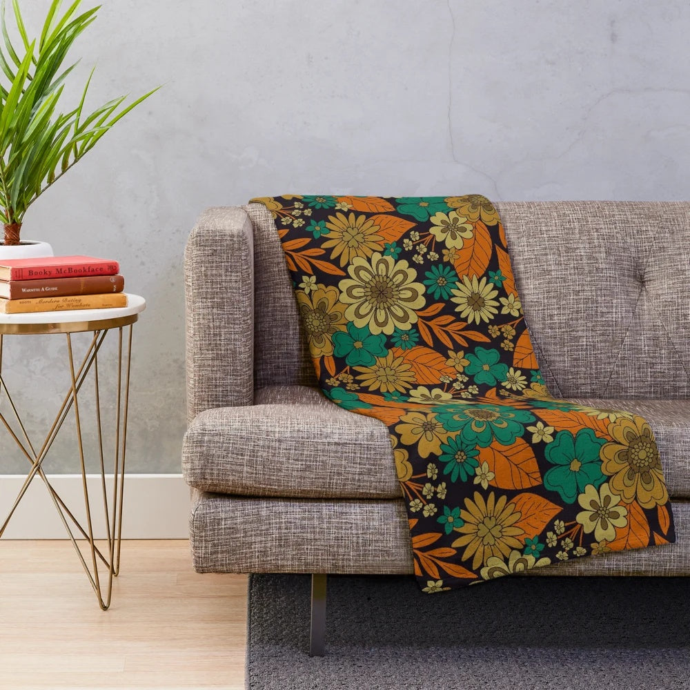 Plush floral blanket in teal and orange colors