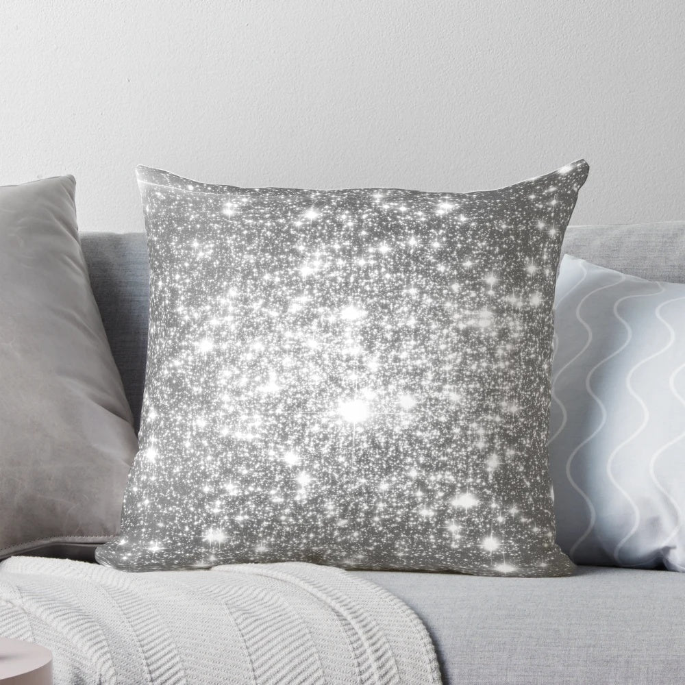 Shimmering galaxy-inspired silver and gray pillow with sparkling stars