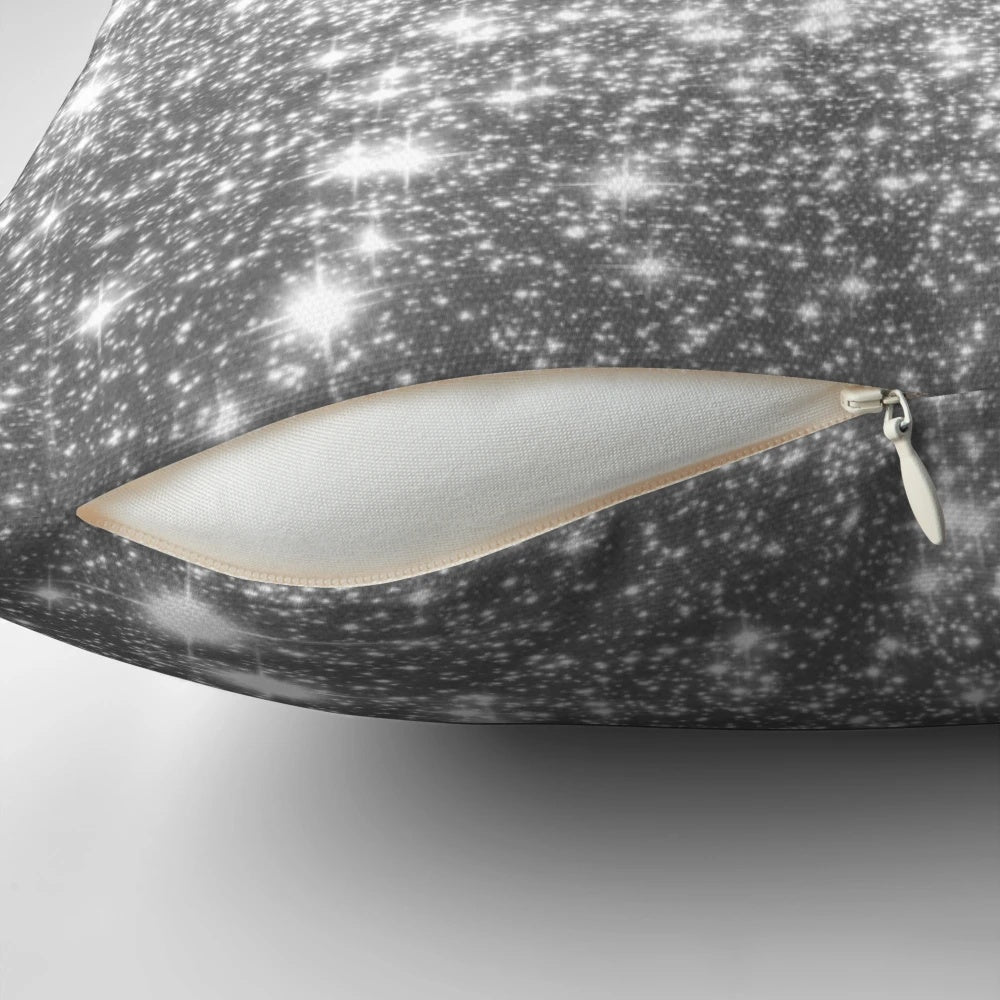 Shimmering galaxy-inspired silver and gray pillow with sparkling stars