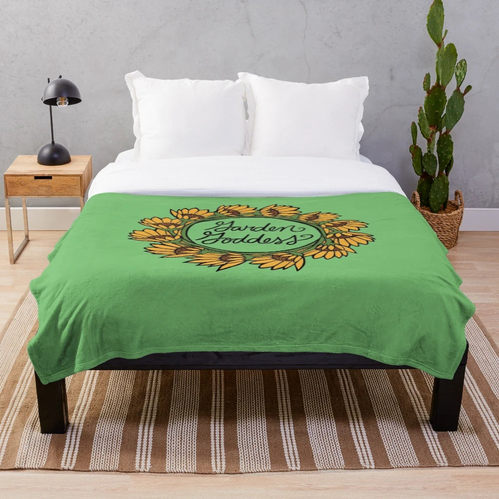 Soft and cozy garden goddess plush blanket with floral design