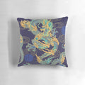 Vibrant turquoise and gold gilded dragon pattern on a decorative throw pillow