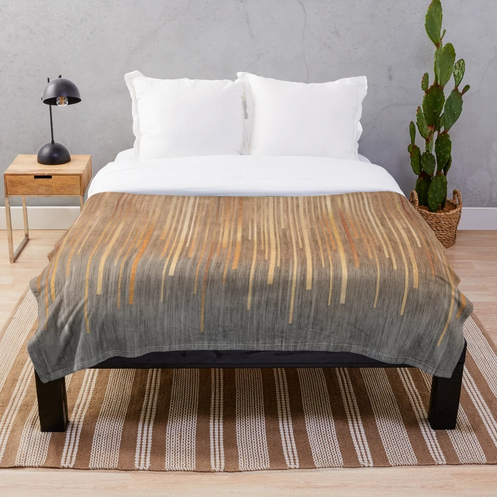 Gold and grey striped plush blanket