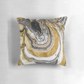 Cozy gold and black stone-like patterned pillow with a natural, geode-inspired design.
