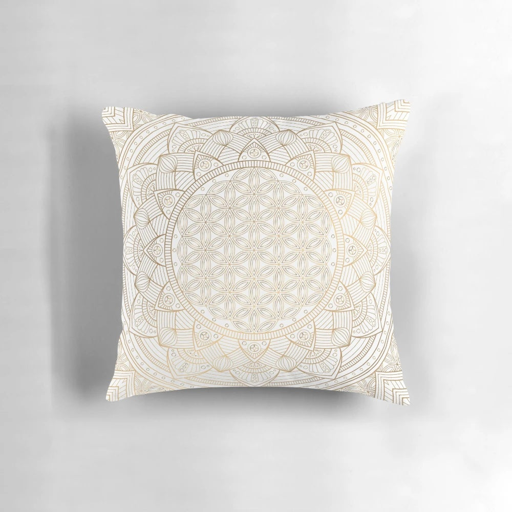 Gold mandala pattern pillow with white shimmer