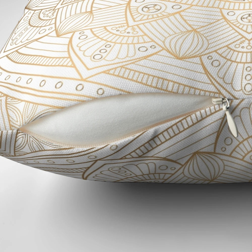 Gold mandala pattern pillow with white shimmer