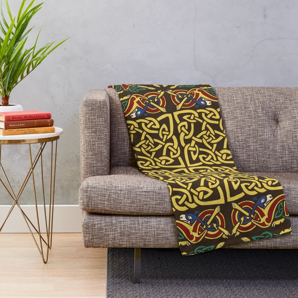 Gold plush blanket with Celtic knot design and medieval hounds border