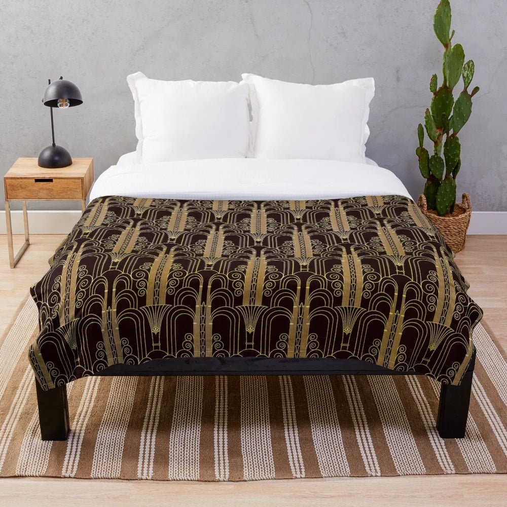 Glamorous gold-colored art deco patterned plush blanket