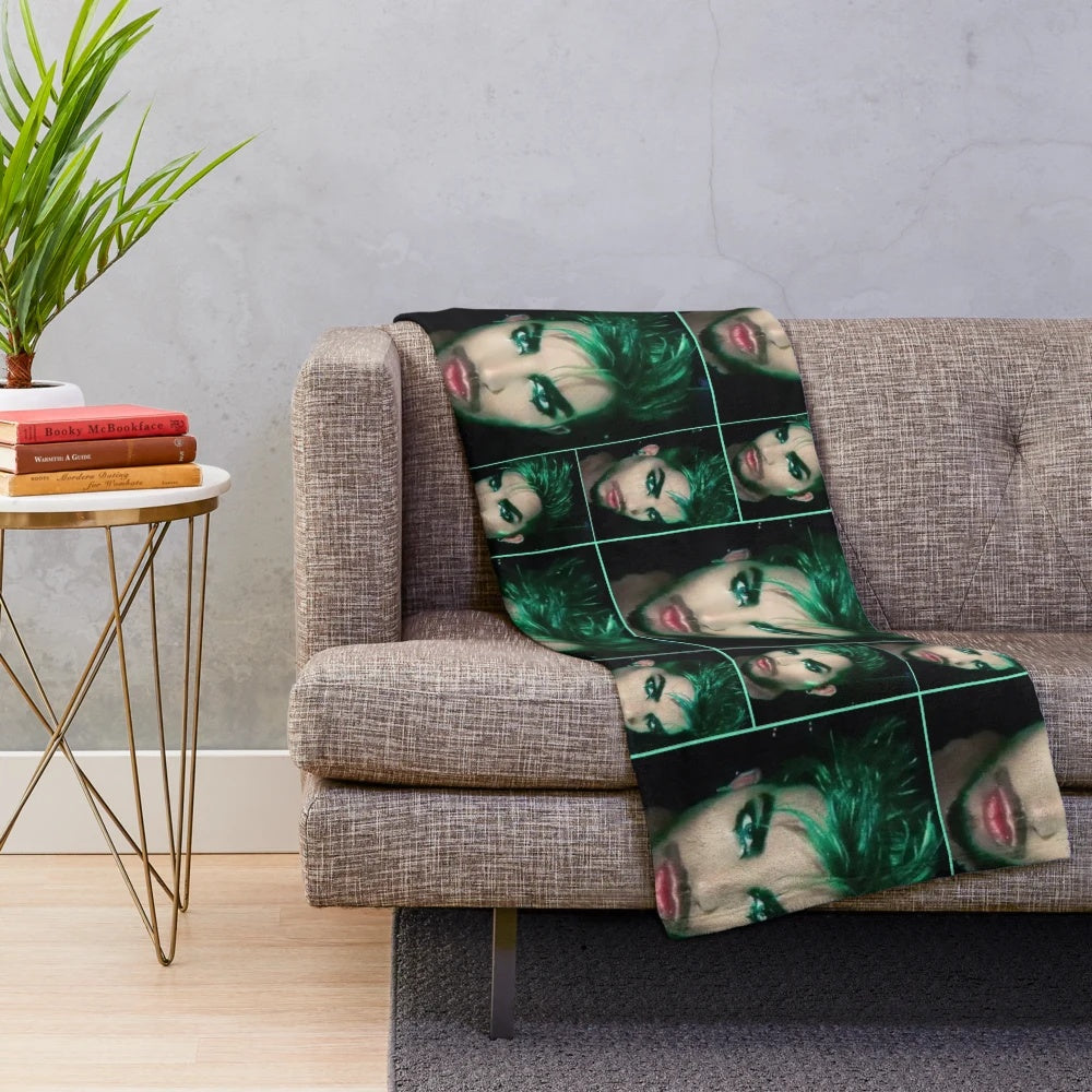 Soft and cozy green plush blanket featuring the image of music artist Adam Lambert