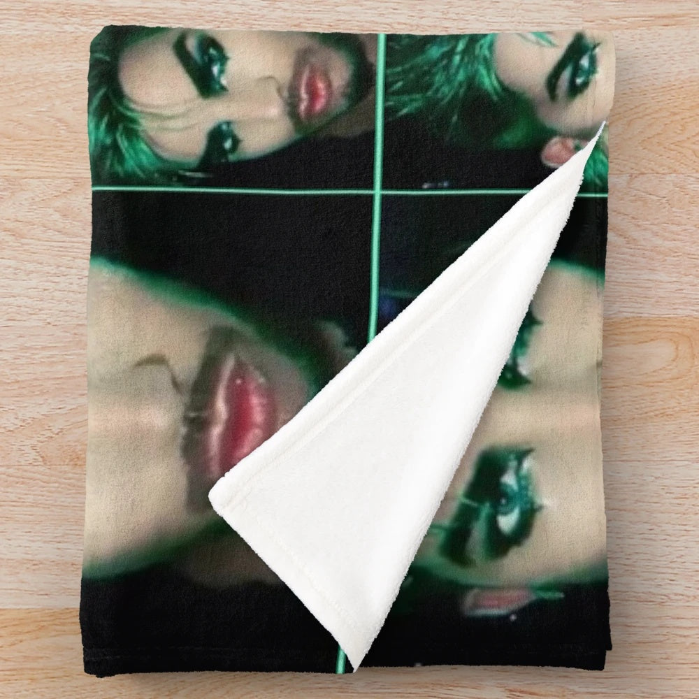 Soft and cozy green plush blanket featuring the image of music artist Adam Lambert