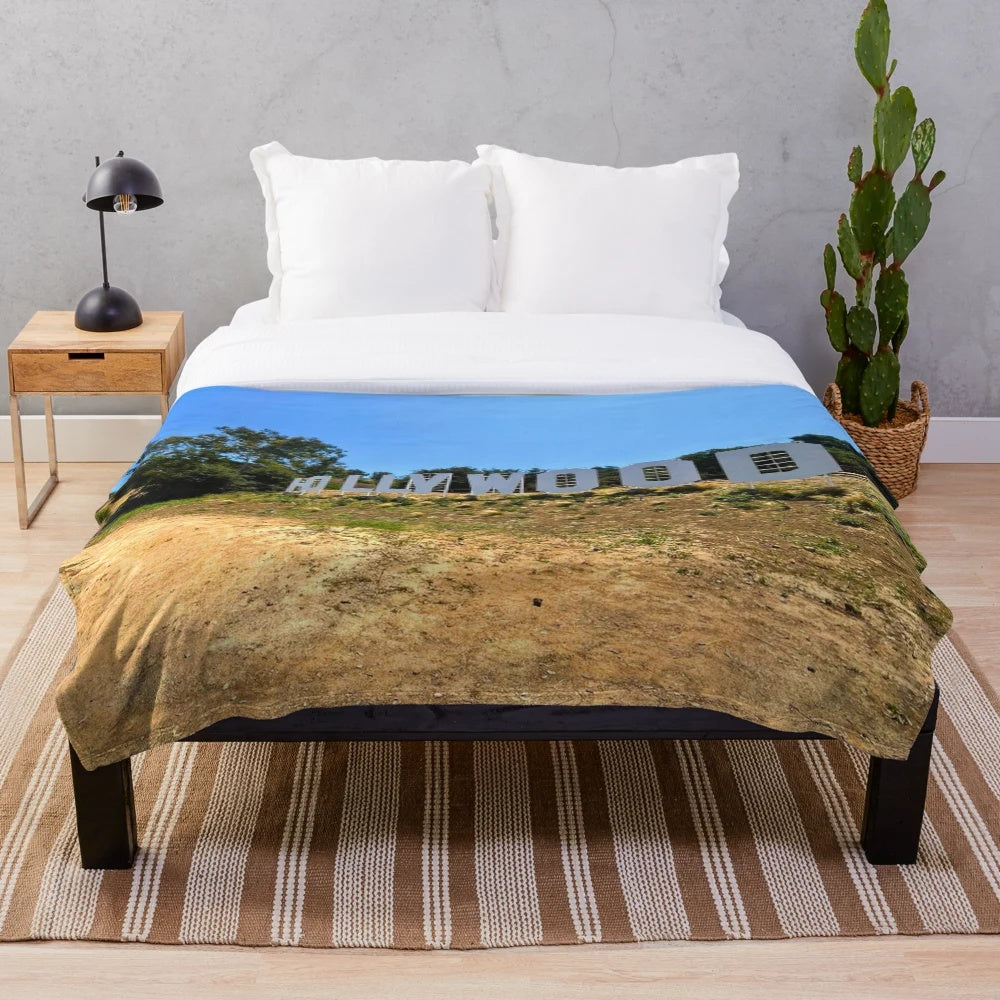 Plush blanket featuring a scenic landscape with mountains, sky, and nature