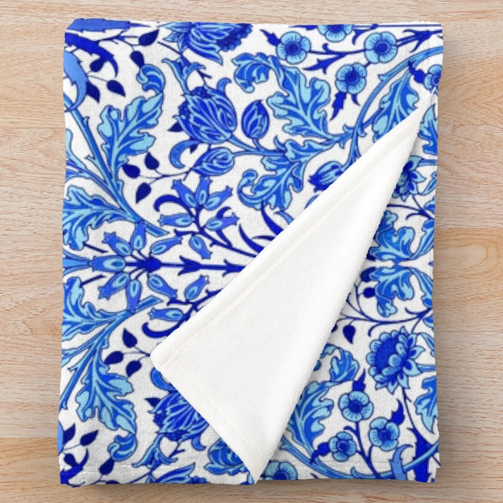 William Morris-inspired hyacinth floral print plush blanket in cobalt blue and white