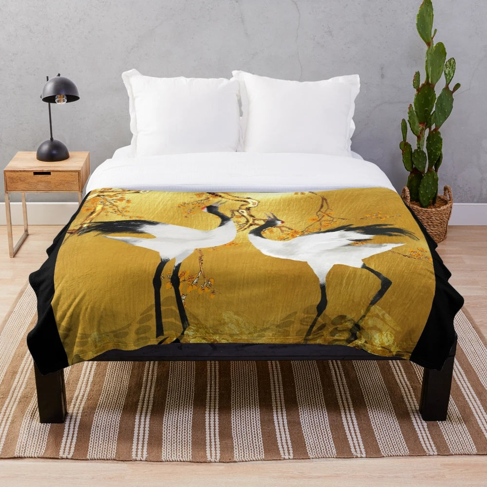 Soft and cozy plush blanket featuring a beautiful golden crane design inspired by Japanese art