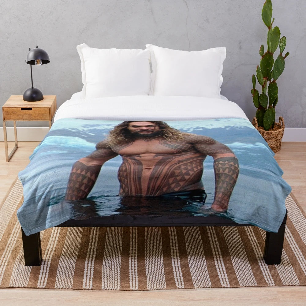 Soft and cozy plush blanket featuring the image of actor Jason Momoa