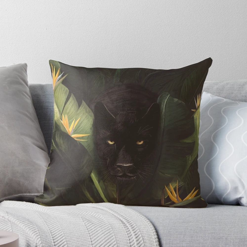 A plush and vibrant pillow featuring a jungle-inspired design with lush foliage, wild animals, and a touch of tropical charm.