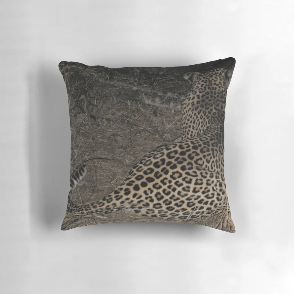 Soft, plush leopard print pillow with a textured animal skin design
