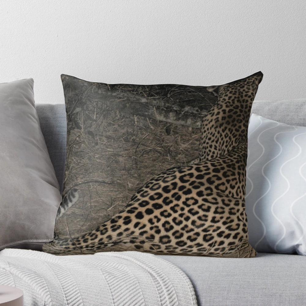 Soft, plush leopard print pillow with a textured animal skin design