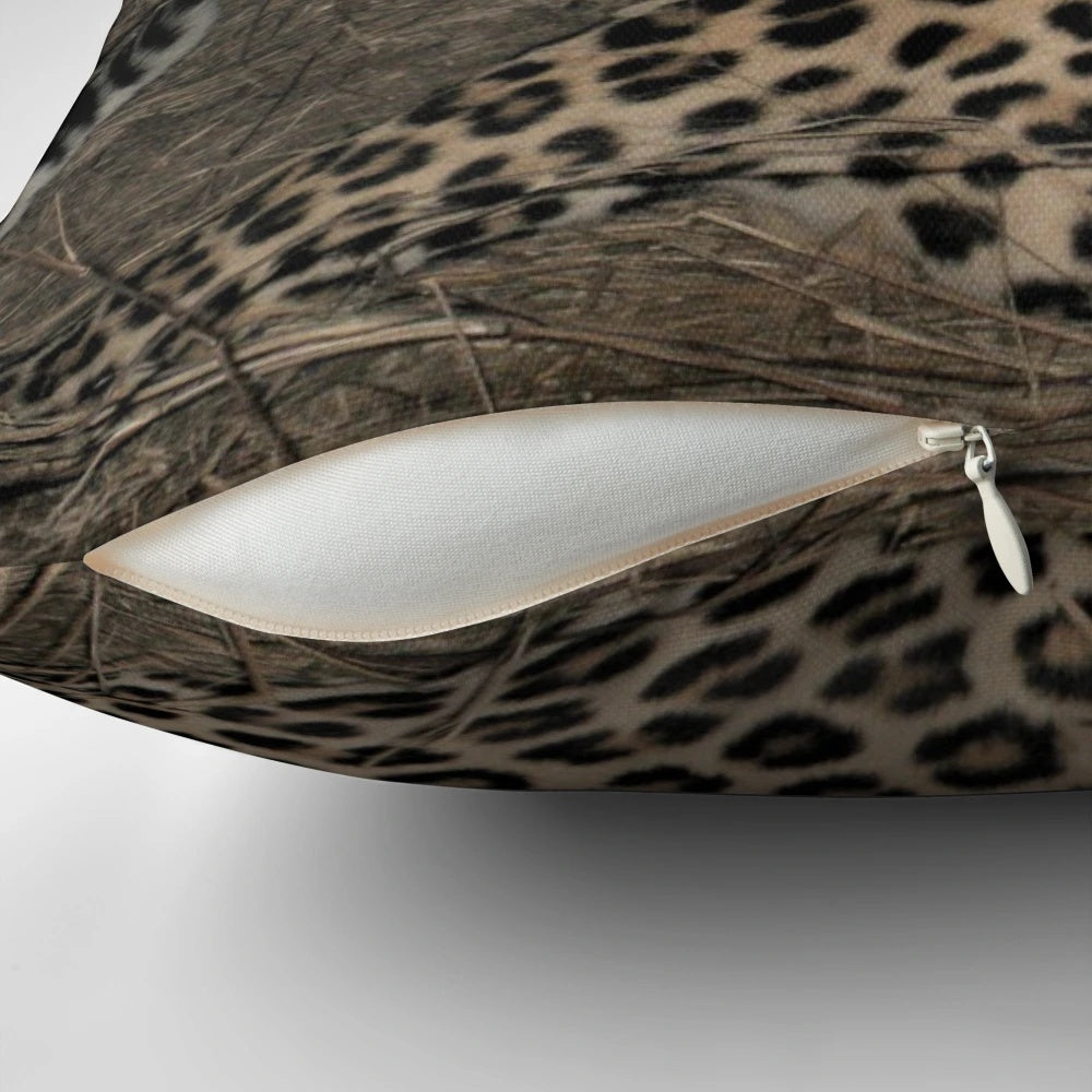 Soft, plush leopard print pillow with a textured animal skin design