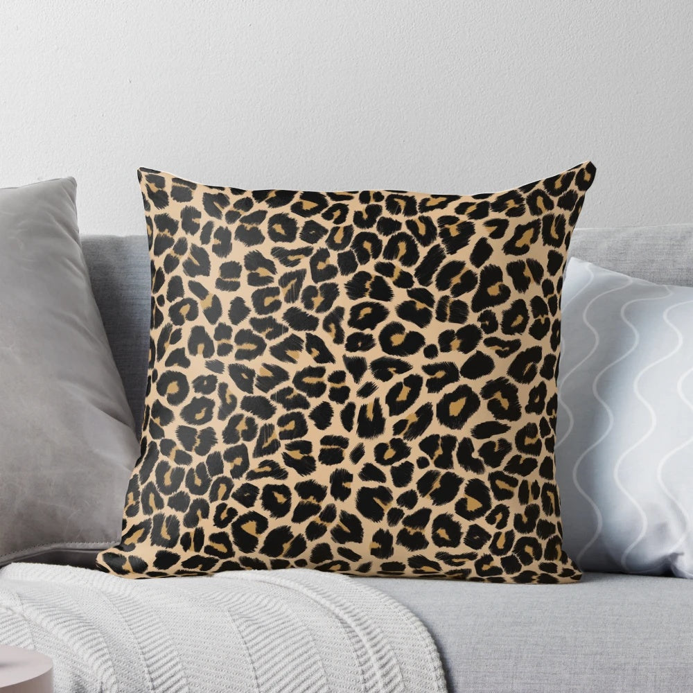 Leopard print pillow with a traditional color palette of browns and beiges