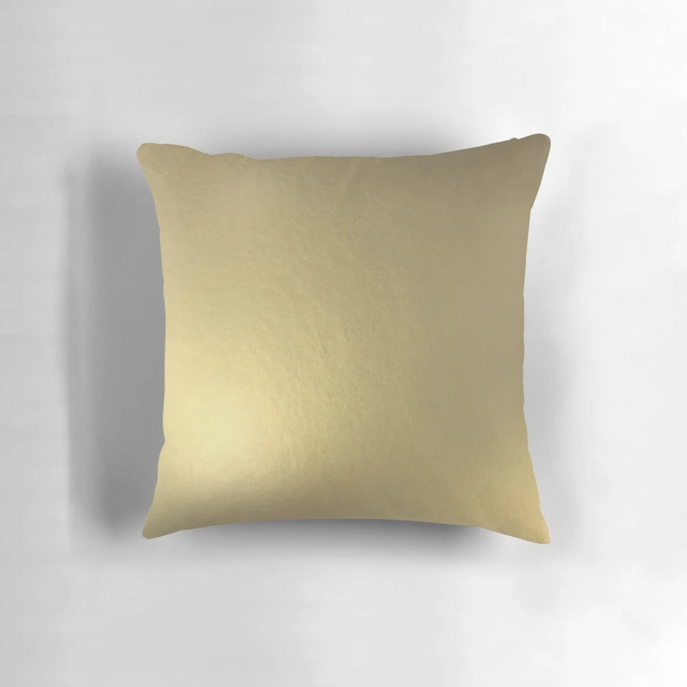 Metallic gold decorative pillow with shimmering finish