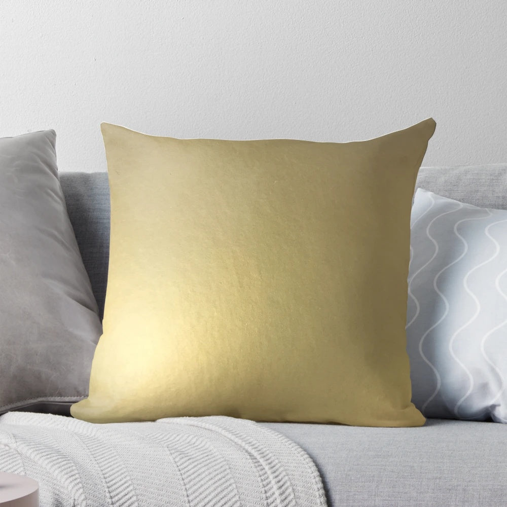 Metallic gold decorative pillow with shimmering finish