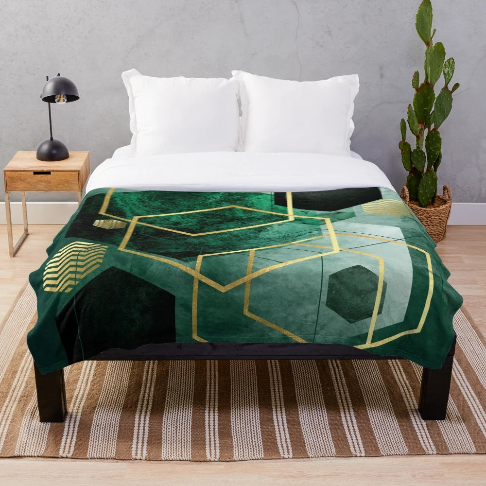 Emerald green plush blanket with hexagon and polygon geometric pattern