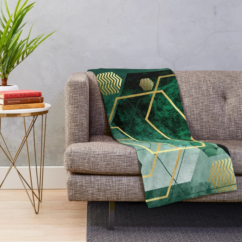 Emerald green plush blanket with hexagon and polygon geometric pattern