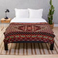 Moroccan-inspired plush blanket with vintage pattern