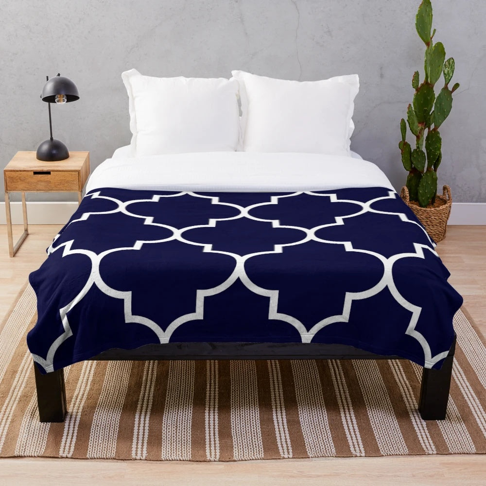 Navy blue quatrefoil patterned plush blanket