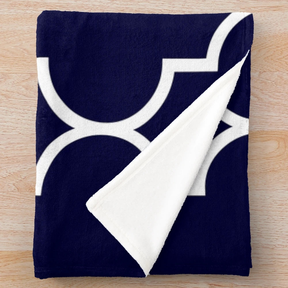 Navy blue quatrefoil patterned plush blanket