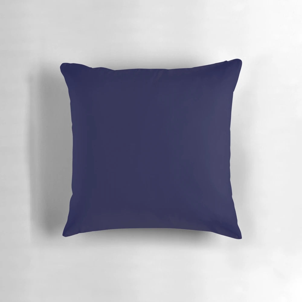 Navy blue solid color pillow by rewstudio, perfect for coastal and beach home decor