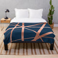 Soft, modern navy blue and rose gold geometric plush blanket