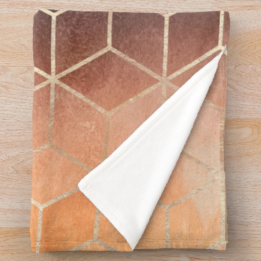 Ombre patterned plush blanket with geometric cube design
