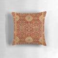 Ornate 16th century Ottoman court-inspired carpet print pillow with rich red, gold, and floral patterns