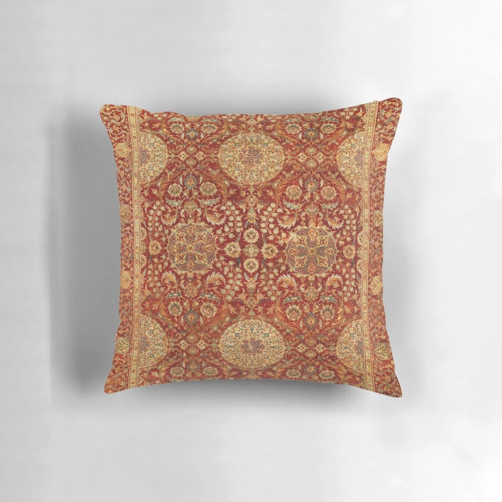 Ornate 16th century Ottoman court-inspired carpet print pillow with rich red, gold, and floral patterns