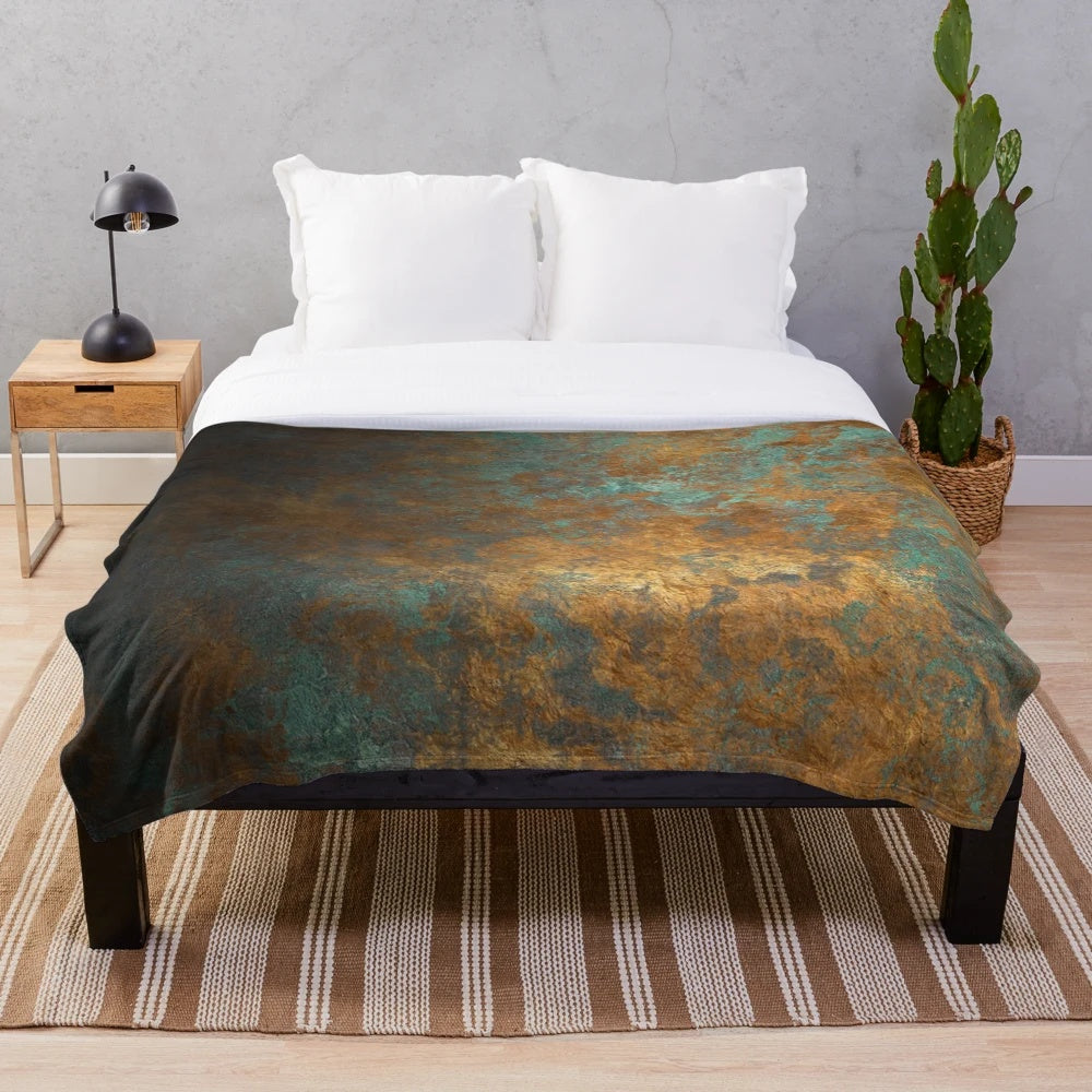Closeup of an oxidized copper plush blanket with a metallic sheen