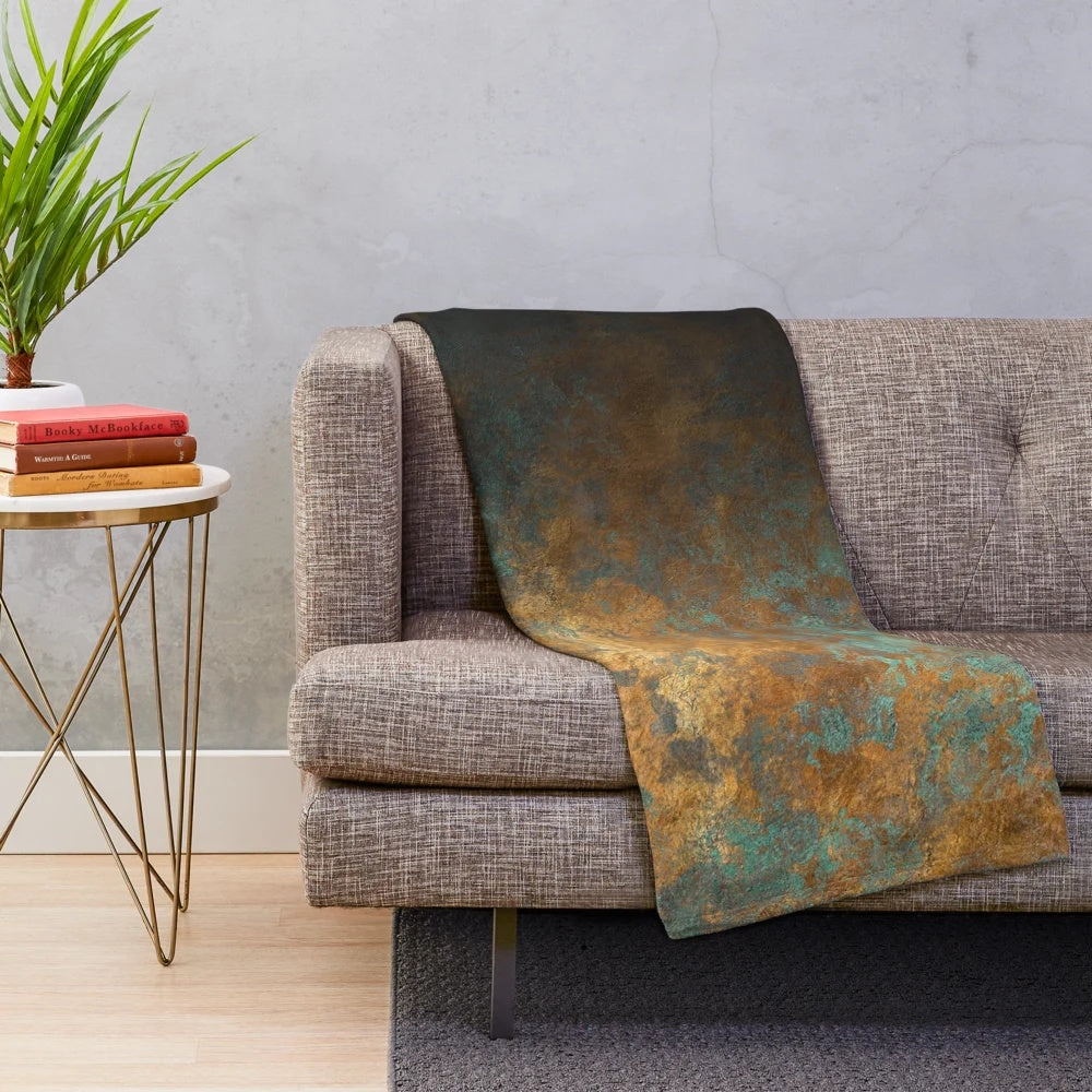 Closeup of an oxidized copper plush blanket with a metallic sheen