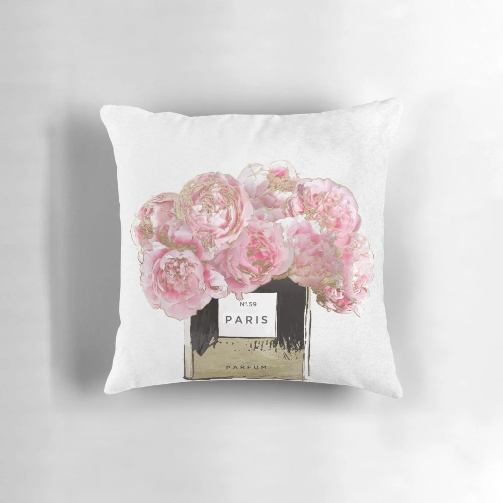 Plush pink peony scented pillow with golden accents, inspired by the allure of Parisian perfumes.