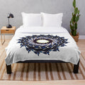 Plush designer blanket with vibrant, symmetrical pattern