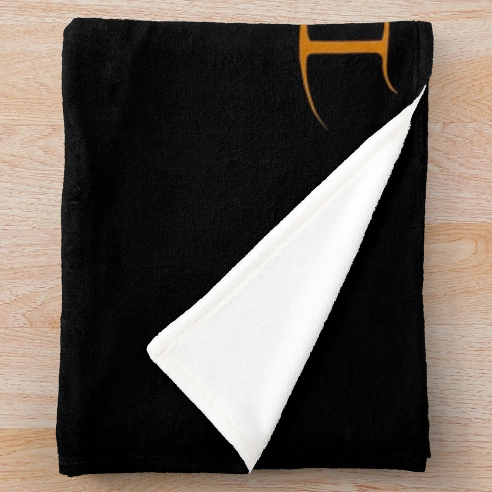 Soft, plush blanket in a neutral color for cozy comfort