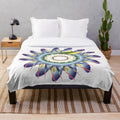 Plush designer blanket with a vibrant and symmetrical pattern