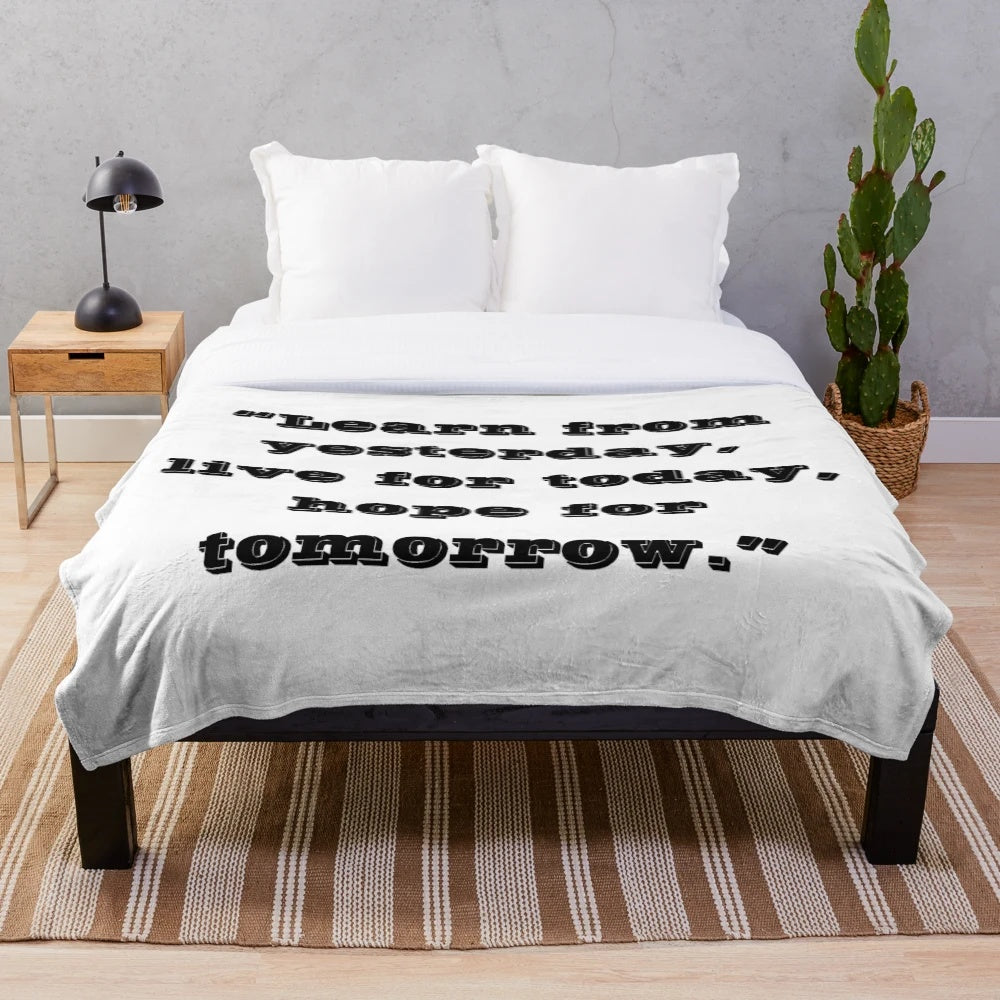 Luxurious designer plush blanket with a vibrant and symmetrical pattern