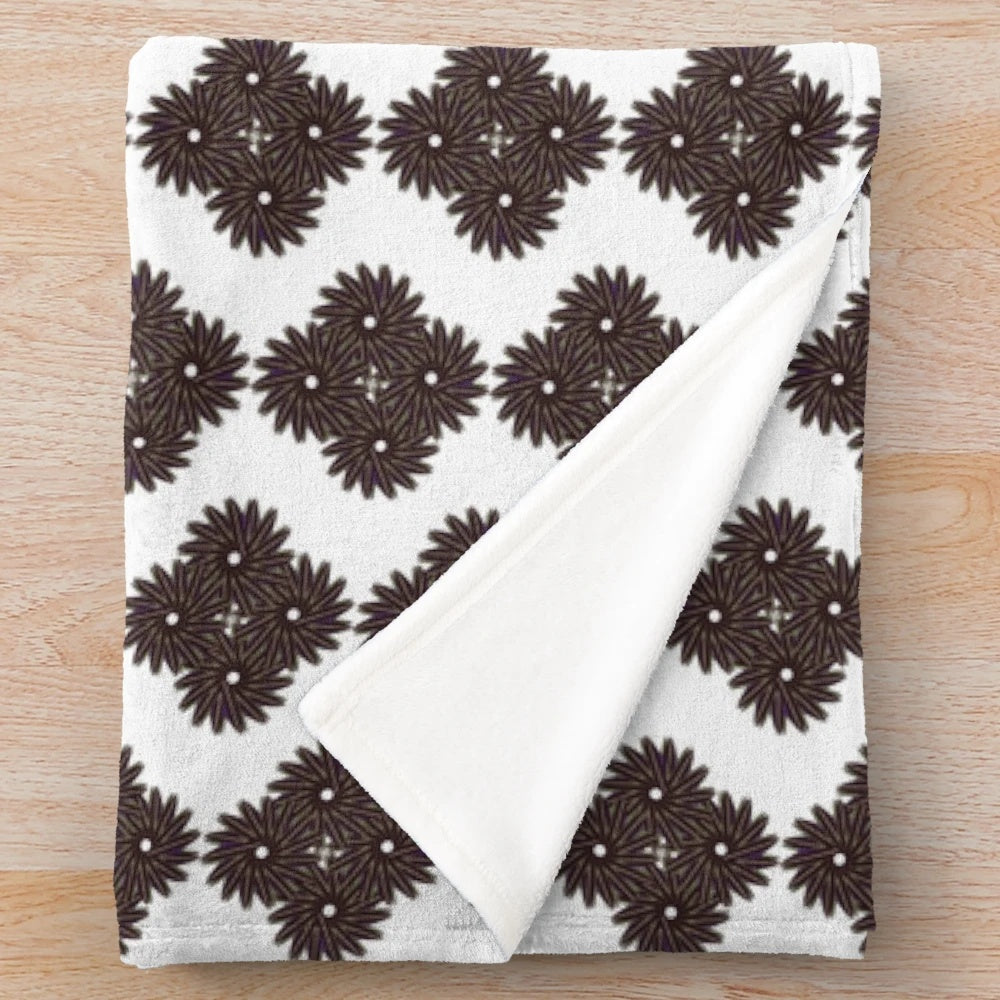Plush designer blanket with a vibrant and symmetrical pattern
