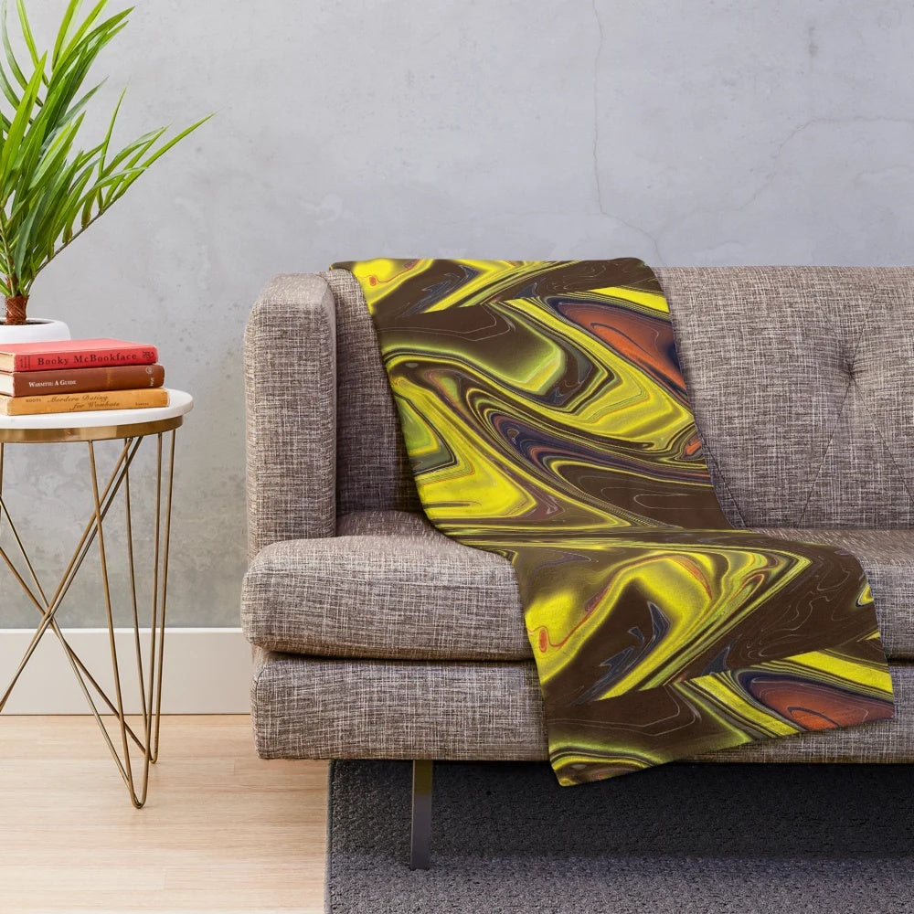 Soft, cozy, and vibrant plush blanket with a designer's touch