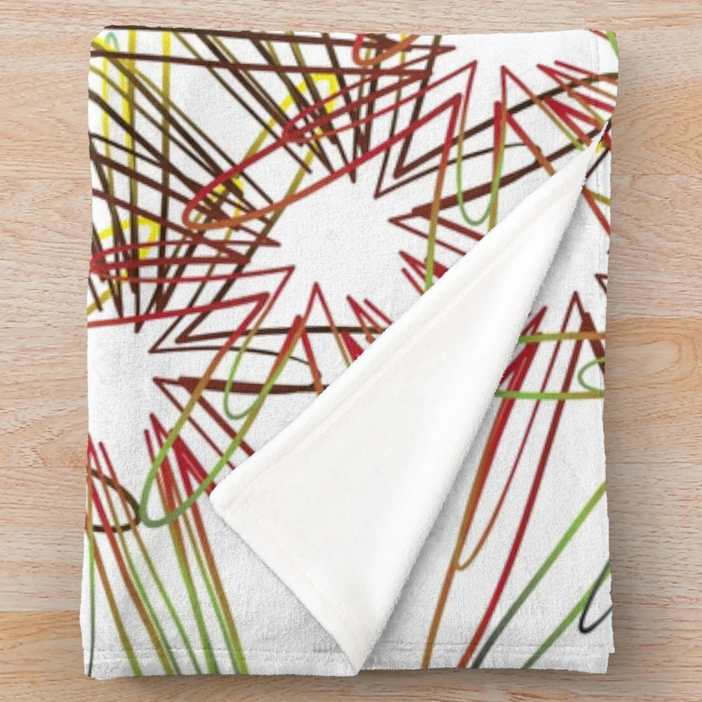 Soft and cozy plush blanket with a designer's touch