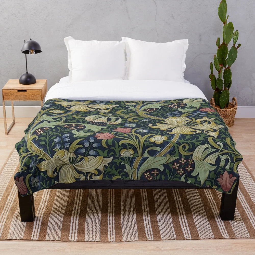 Plush blanket featuring the iconic golden lily floral pattern designed by British artist William Morris