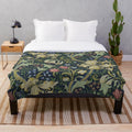 Plush blanket featuring the iconic golden lily floral pattern designed by British artist William Morris